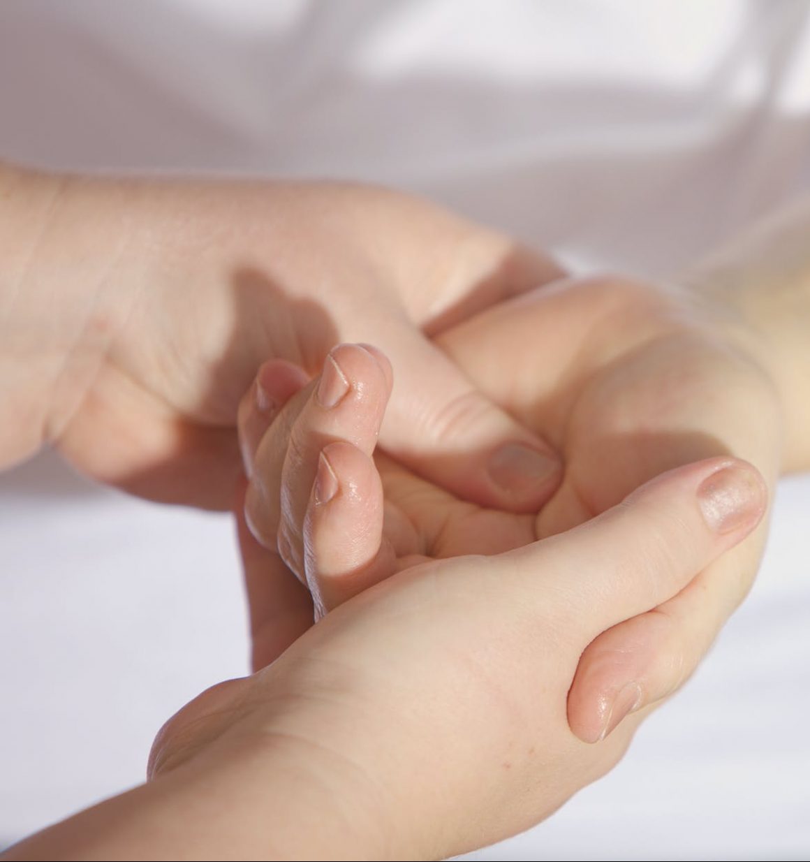 treatment-finger-keep-hand-161477 person holding hand